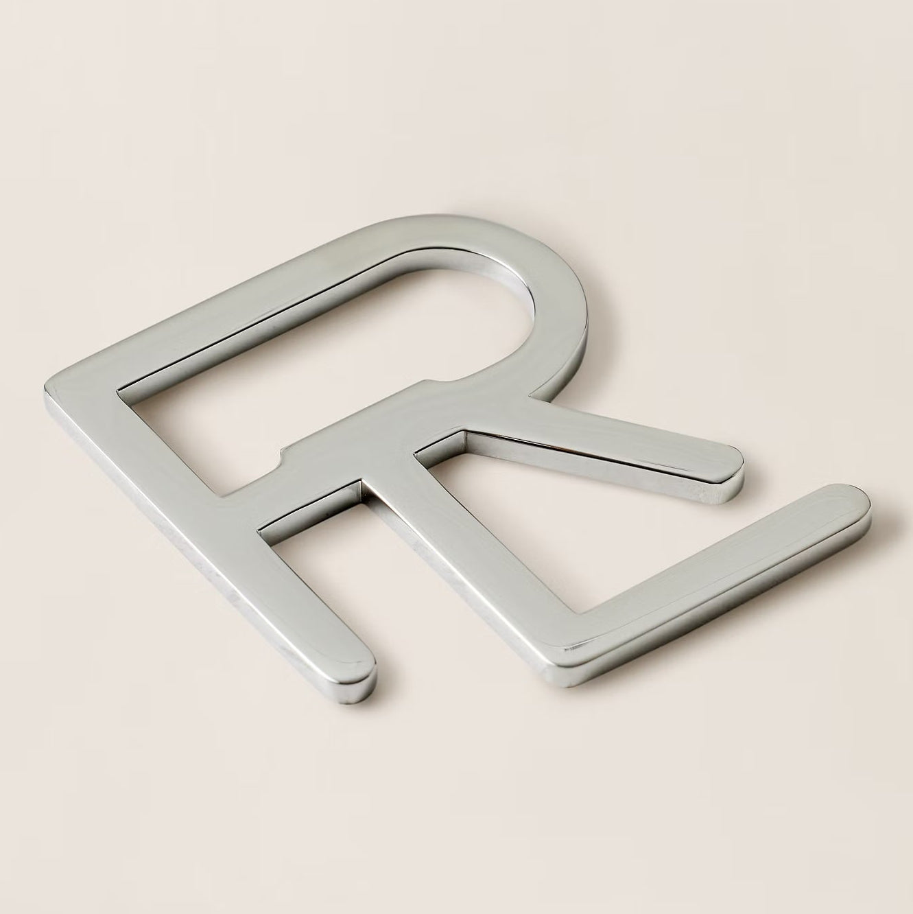 Décapsuleur à monogramme RL superposé