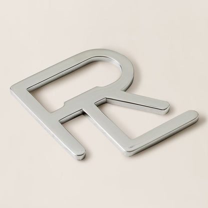 Décapsuleur à monogramme RL superposé
