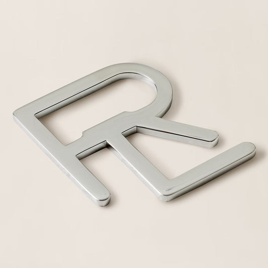 Décapsuleur à monogramme RL superposé
